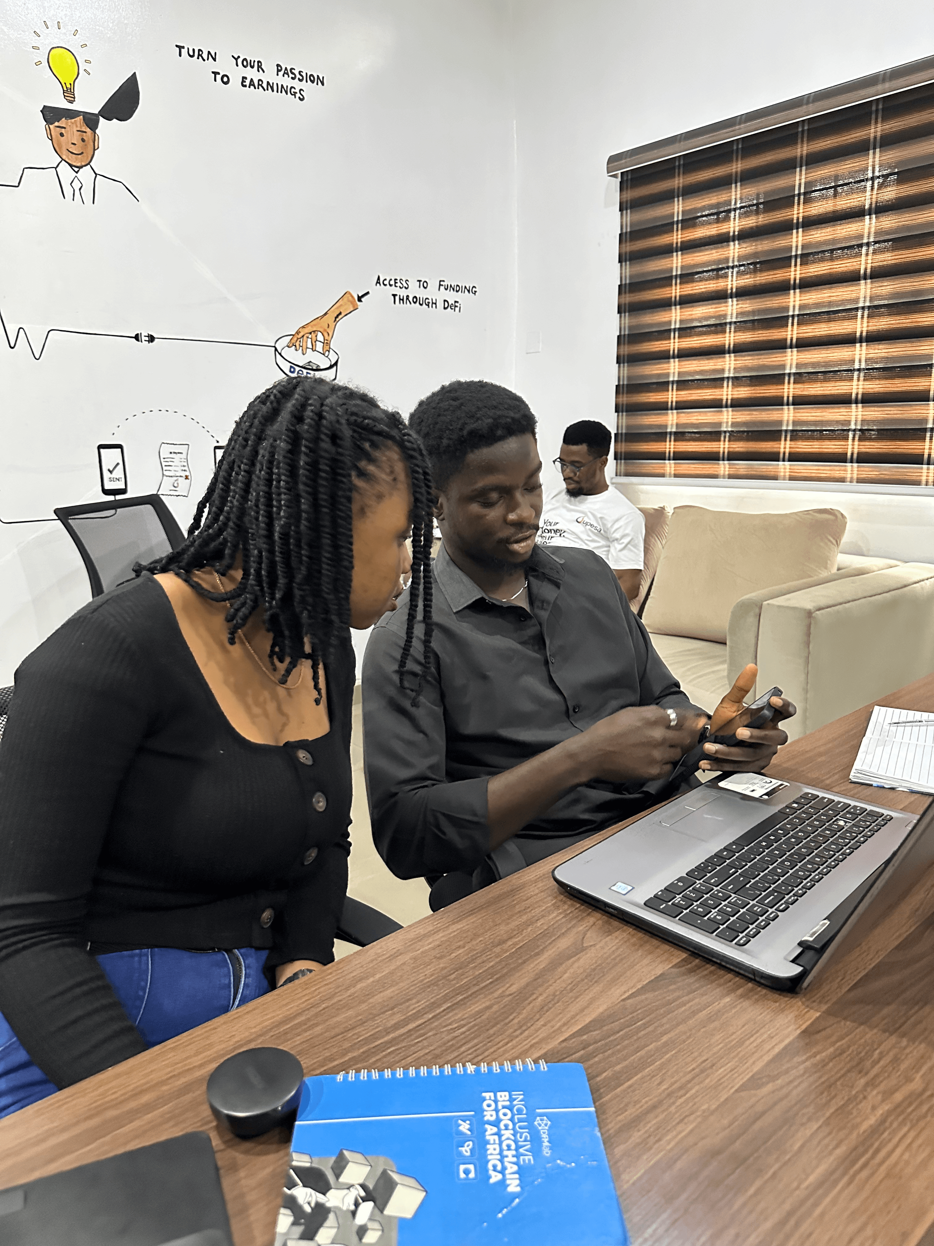Laptop showing the Upesa product dashboard on a desk